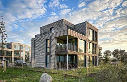 Marienleuchte Apartment | BeltBlick 4 - Moderne Ferienwohnung direkt am Strand mit Sauna und Meerblick!