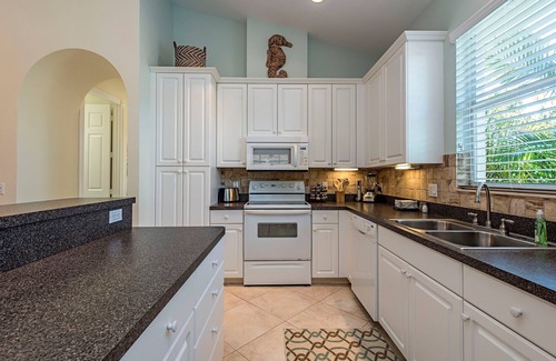 Naples Park House | Best Value in Naples! Spotless Luxury 4 Bdrm Heated Pool Walk Bike To Beach
