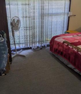 Bidwill House | BIDWILL GARDENS ON MIDDLETON - Private Room King-Size Bed or Open Lounge Room Floor Mattress SHARED Bathroom FREE Kitchen Essentials FREE Laundry Facilities Fast NBN WIFI HDTV NETFLIX, YOUTUBE, KAYO Private Transport and Meal Services Available On Request