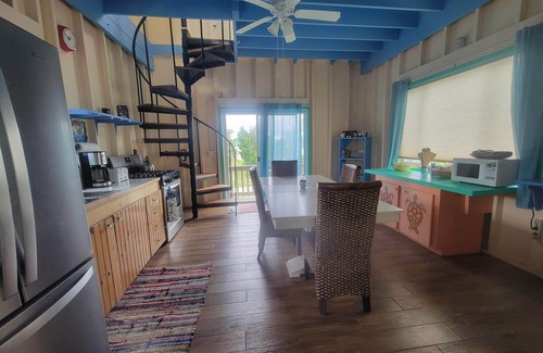 Great Guana Cay Cottage | Blue Coral Landing 4 Bedroom 4 Bath With Dock Guana Cay Abaco Bahamas Free WiFi
