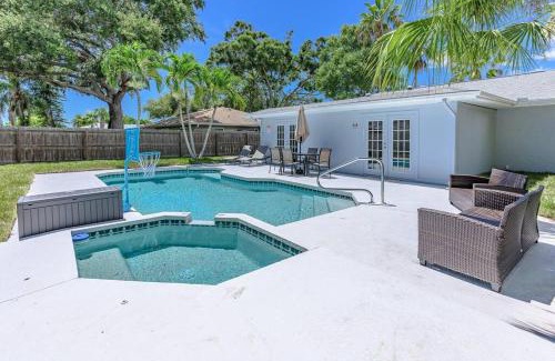 Palma Sola House | Blue Palm Home with Pool, Hot Tub, Nearby Beach, Outdoor Shower