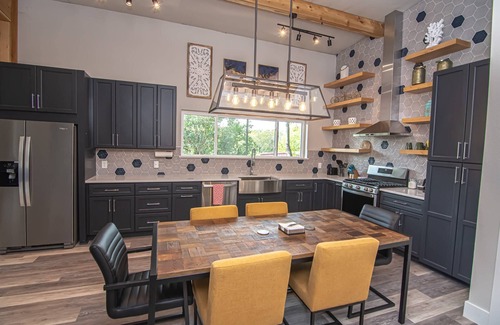 Morgan Apartment | Blue Star Bungalow at Lake Whitney: Pet-Friendly Secluded Lake Retreat, Wrap Around Deck & Fire Pit