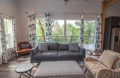 Morgan Apartment | Blue Star Bungalow at Lake Whitney: Pet-Friendly Secluded Lake Retreat, Wrap Around Deck & Fire Pit