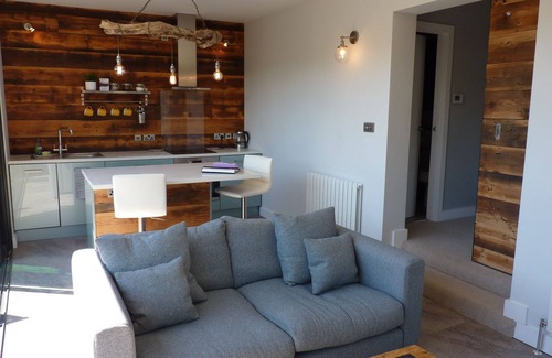 Croyde Apartment | Board Room @ Green Rooms, a contemporary and spacious one bedroom apartment