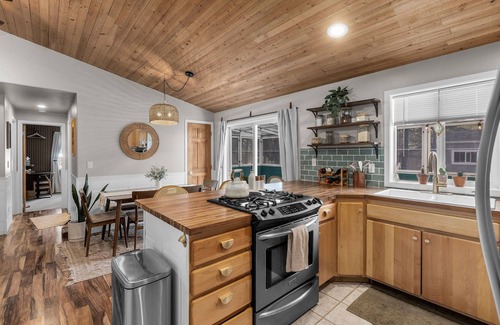 Three Rivers House | Boho Bungalow, 2 bedroom mid century modern cabin in Sunriver featuring a yoga s