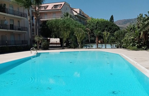 Calatabiano Apartment | Bouganville Residence: DeLuxe apartment facing the pool, sports field and games.