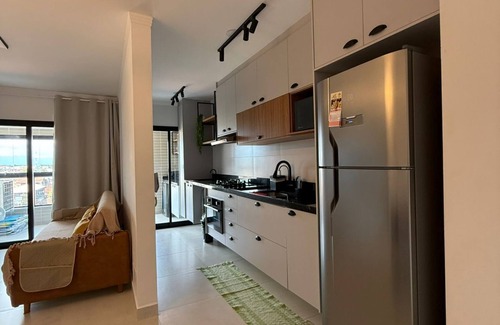 Praia Grande Apartment | Brand new apartment right on the sand with sea view.