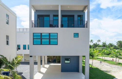 Monroe County House | Brand New Oceanside Paradise Waterfront with Pool and Hot Tub