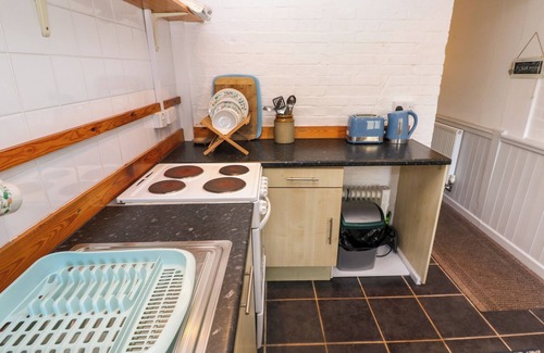 Landewednack Cottage | BRICK COTTAGE, pet friendly, character holiday cottage in The Lizard