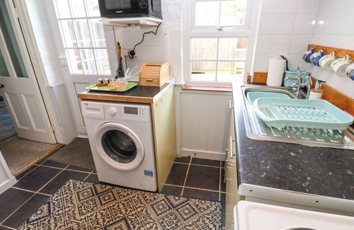 Landewednack Cottage | BRICK COTTAGE, pet friendly, character holiday cottage in The Lizard
