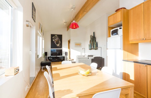 Stokkseyri Apartment | Bright & stylish flat with modern art, big balcony & hot tub. Family friendly.