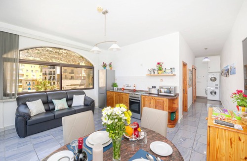 Munxar Apartment | Brilliant Beachfront Apartment with Super Sunset views in Xlendi Bay, Gozo Malta
