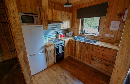 Taynuilt Cabin | BURNSIDE is a charming, Well Equipped Log Cabin In Stunning Location.