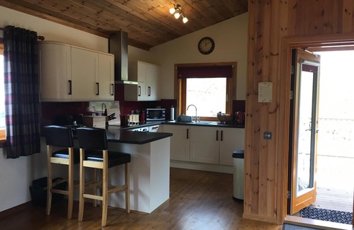 Banavie Ski Chalet | Burnside Lodge, overlooking river Lundy, backdrop of Ben Nevis and Nevis Range.