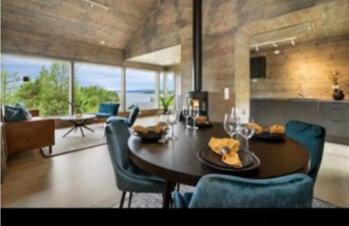 Aure House | Cabin at the end of Skardsøya towards the sea - boat