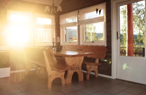 Storslett Cabin | Cabin by the river