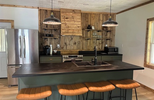 Dennis Cabin | Cabin near Bay Springs Lake! Enjoy the outdoors with convenience of WiFi.