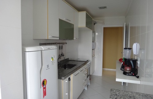 Centro Apartment | Cabo Frio, foot in the sand, beautiful coverage with air conditioning, barbecue, sink.