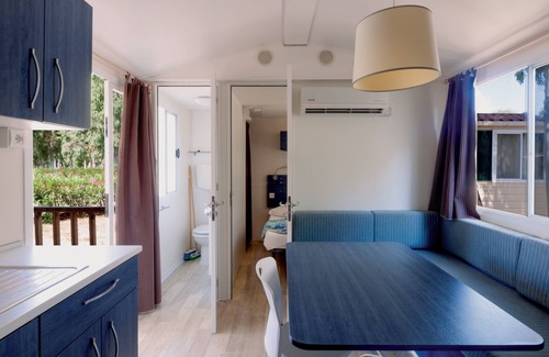 Fertilia House | Camping Village Laguna Blu by Interhome