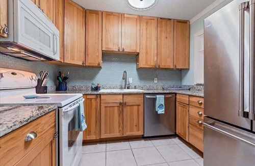 Bayshore Gardens House | CANAL FRONT! Bring or rent a boat, near AMI/IMG + HEATED POOL