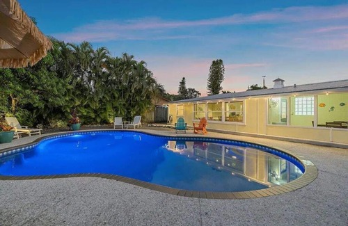 Bayshore Gardens House | CANAL FRONT! Bring or rent a boat, near AMI/IMG + HEATED POOL