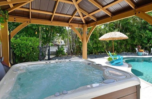 Bayshore Gardens House | CANAL FRONT! Bring or rent a boat, near AMI/IMG + HEATED POOL
