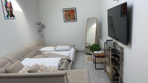 Locmaria-Grand-Champ Bed & Breakfast | Canapé panoramique dans loft
