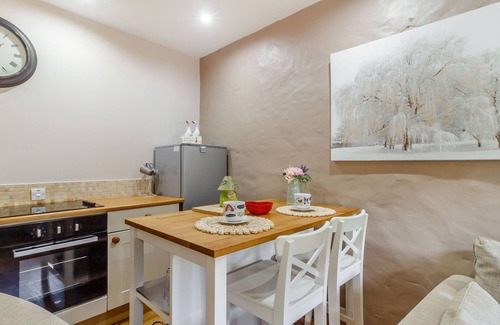 Blackmill Cottage | CANER BACH LODGE, pet friendly, with a garden in Blackmill