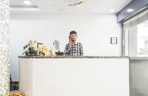 Guntur Hotel | Capital O Aditya Grand
