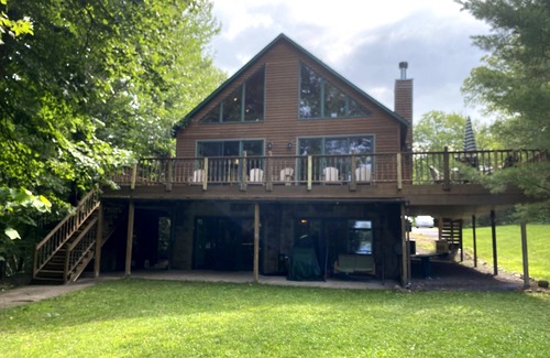 Chief Lake Cabin | Captivating Views of Lake Chippewa from Three Level Chalet Cabin & Lake Home