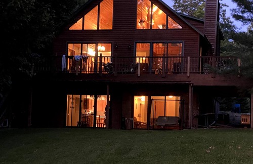 Chief Lake Cabin | Captivating Views of Lake Chippewa from Three Level Chalet Cabin & Lake Home