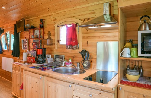 Saint-Genix-sur-Guiers RV Rental | Caravan 'Roulotte De Bohême - Praline' with Shared Pool, Wi-Fi and Air Conditioning