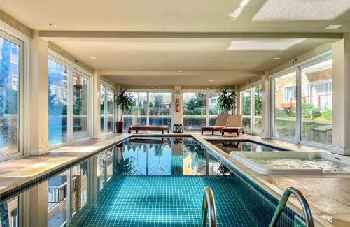 Carniel Apartment | Casa de Pedra 2 Suítes e Piscina by Achei Gramado