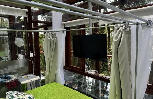 Bueno Brandao Apartment | Casa de Vidro - Vila Mágica
