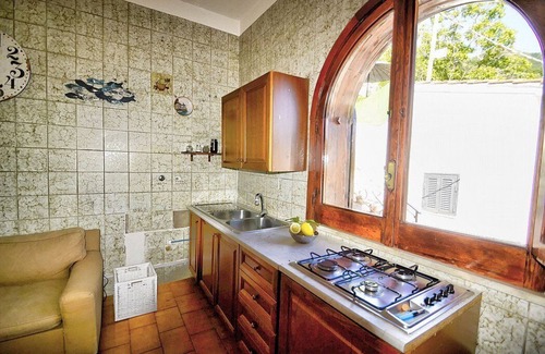 Pucara House | Casa Trifone D: A graceful apartment that is part of a villa surrounded by the greenery, with Free WI-FI.
