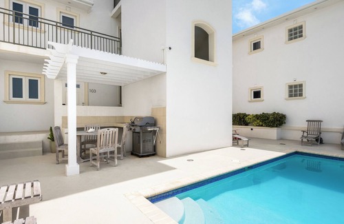 Providenciales Condo | Centrally Located 2 BR W/Pool, Great for Families!