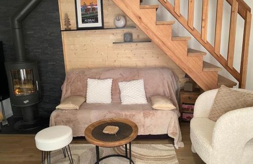 Laguiole Apartment | Chalet chaleureux et fonctionnel