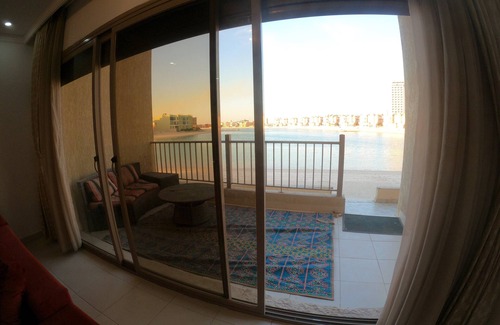 Al Khiran Ski Chalet | Chalet on the ground, the sea is 10 meters away