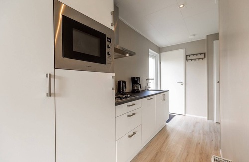 Lathum Ski Chalet | Chalet with Pond View in Gelderland