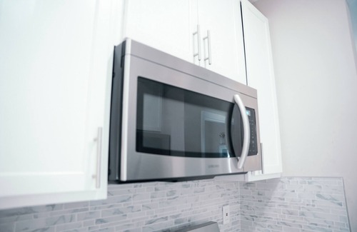 Ashburton House | Charm City Luxury 4 Bedroom Brick Home
