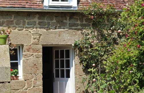La Carneille Cottage | Charming 15th Century Cottage with Garden, Fishing Pond, and Historic Village Setting