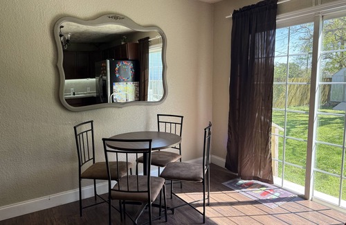 Hitchcock House | Charming 2-bedroom pet-friendly house with fenced yard minutes from Galveston!