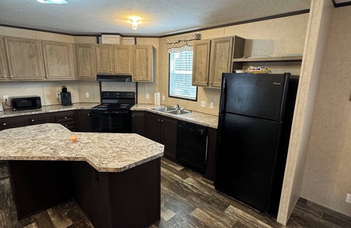 Bastrop House | Charming 3-bedroom mobile home in a peaceful country setting.