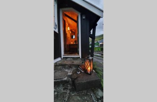 Kvivik House | Charming and Authentic Heritage Retreat in Kvívík - right next to the river