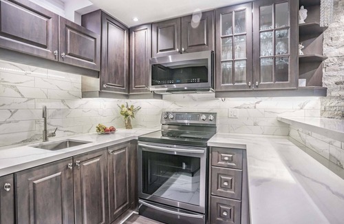 Markham House | Charming basement retreat awaits you!