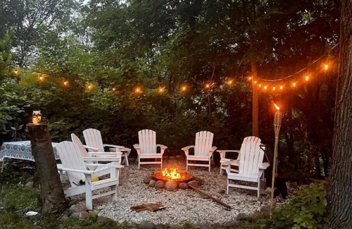 Payne - Phalen House | Charming Cottage with Hot Tub, Fire Pit, & Wooded Backyard
