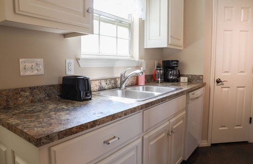 Bentonville House | Charming home in great location with bike rack, fireplace, streaming, grill, W/D