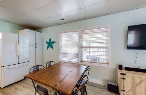 Cherry Grove Beach House | Charming house with hot tub, W/D, dog friendly & close to beach