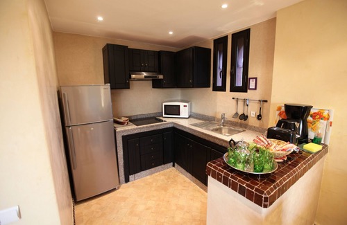Ait Hamid Apartment | Charming residence with services, ideal for families and seniors.