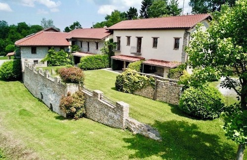Mombarcaro Cottage | charming stone villa with swim lake and tennis court